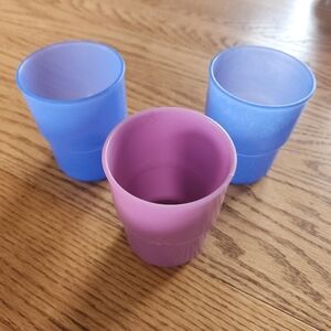 8 oz. Tupperware tumblers 2 blue and 1 purple
